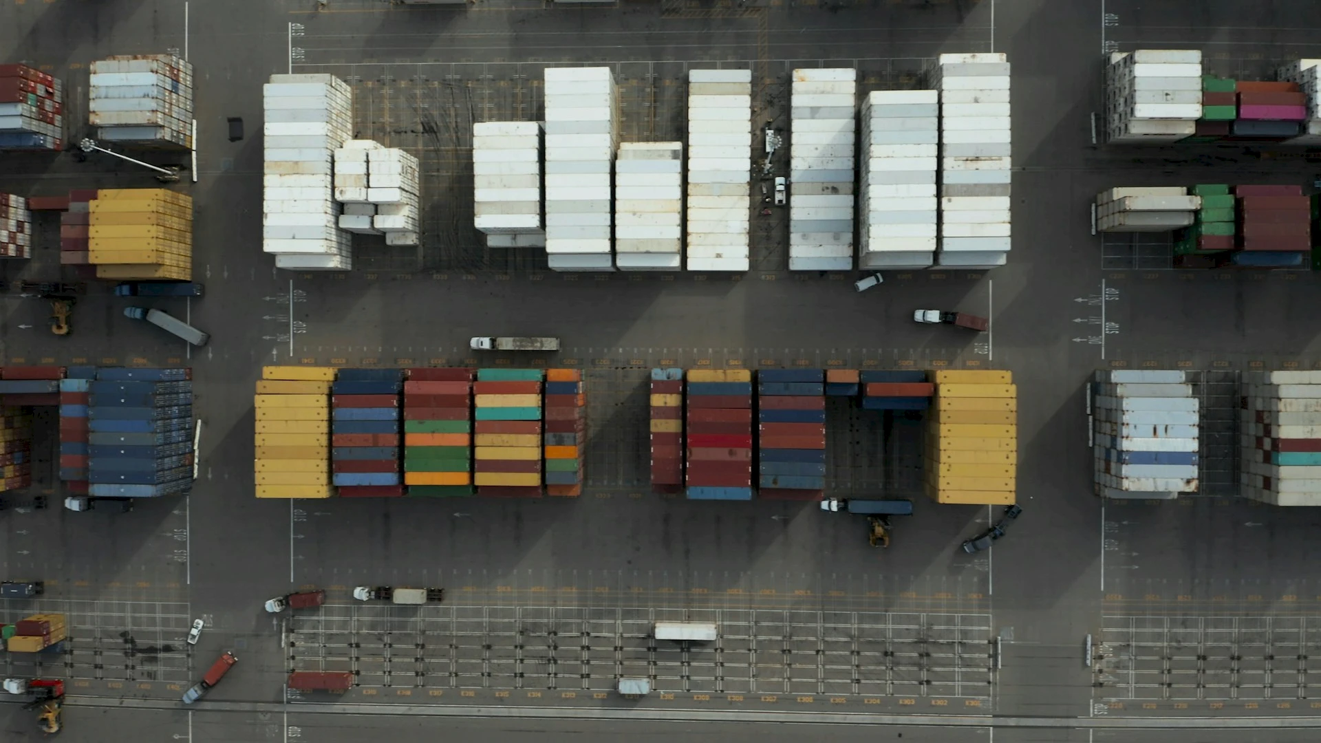 Top view of colorful shipping containers in a storage yard.Credit: Tyler Casey, Unsplash.